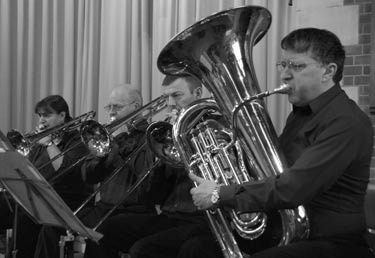 members playing at a concert